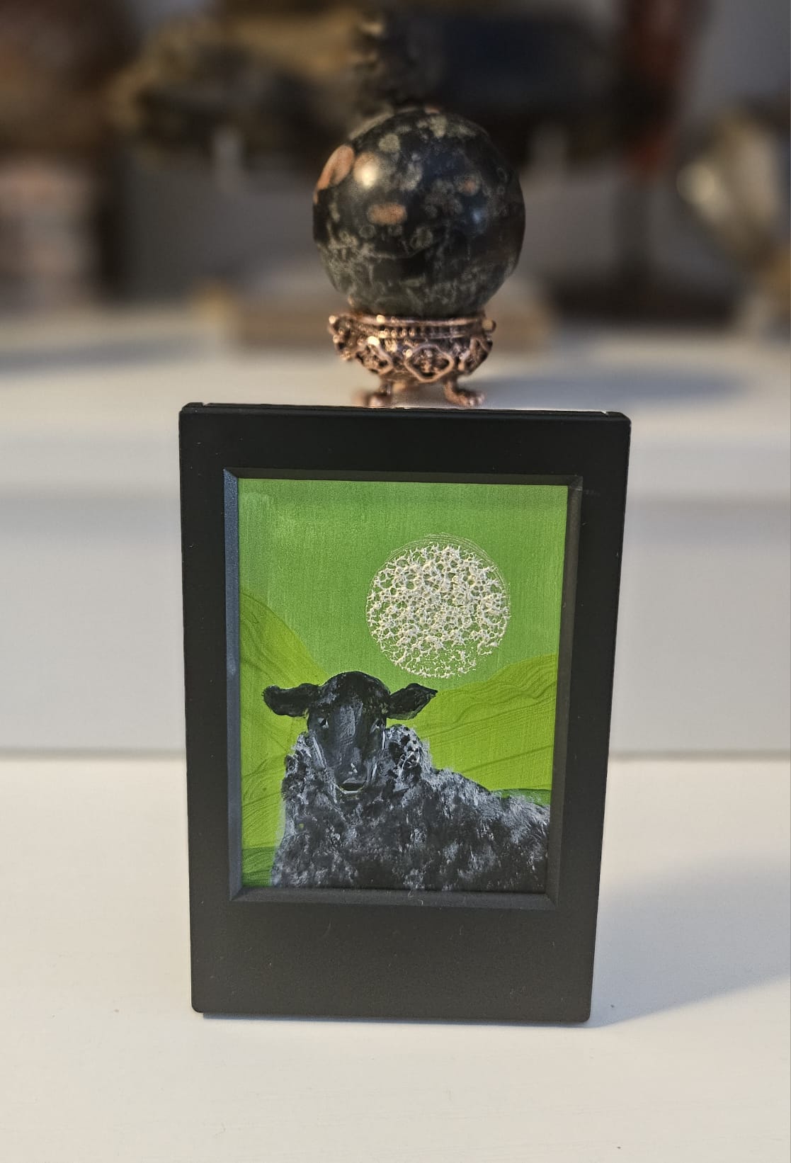 Black Sheep Beneath the Moon