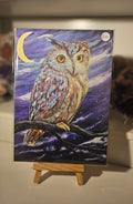 The Owl Beneath the Crescent Moon
